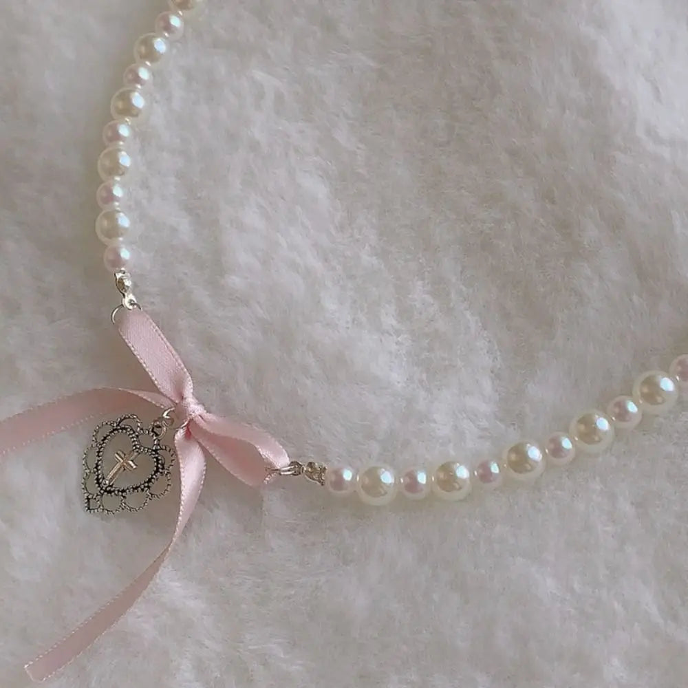 ■ENGBROX■ lissom ribbon pearl necklace EBNL24038 Tiny Pearl Bow Pendant Necklace Silver | Jewellery | Lisa Angel